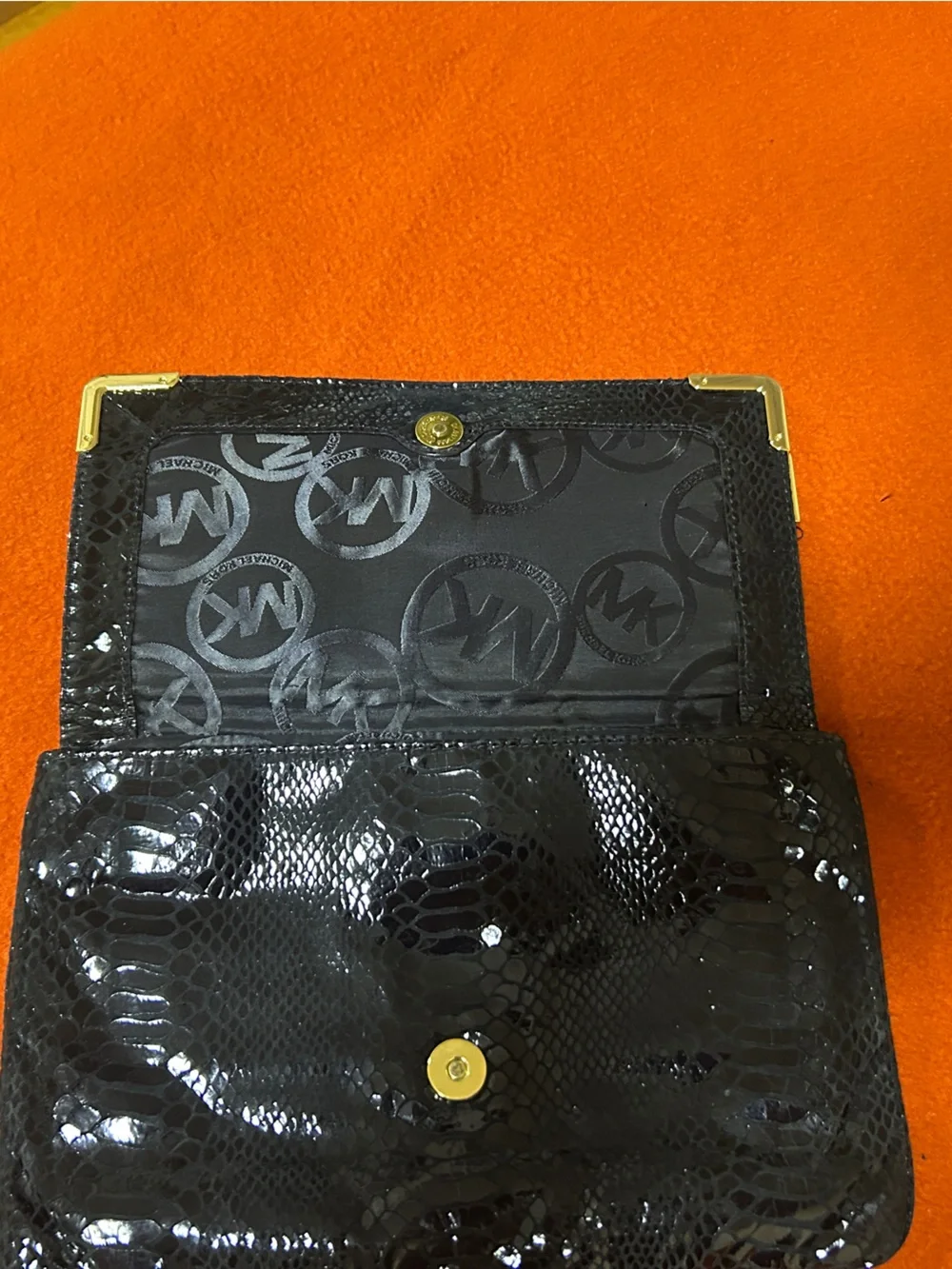 Michael Kors Black Snake-Embossed clutch with Gold Corner Hardware